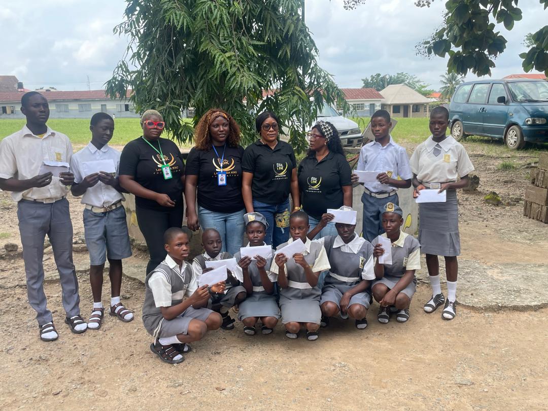 Layole Dhakiki Foundation team with students during school support outreach